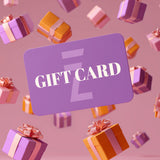 A large purple Doruzova Gift Card with white text reading GIFT CARD is surrounded by floating wrapped presents in pink, purple, and orange, set against a pink background.